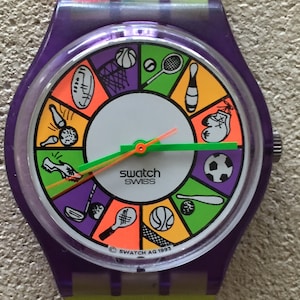 Vintage Swatch swiss unisex watch 35mm AG1993 NEW battery original strap runs well
