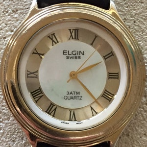 Vintage ELGIN SWISS movement mens quartz watch  w/r30m m.o.p.dial 37mm NEW premium battery runs well c 1980s