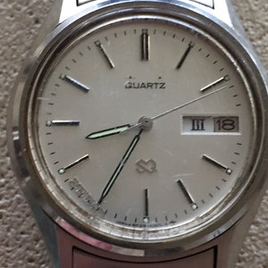 Vintage SEIKO Mens 33mm SQ Roman numeral days original bracelet NEW premium battery all japan runs well c1970s