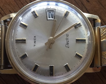 Vintage Timex ELECTRIC Rare Mens Watch W/date Goldtone W Vintage Timex ELECTRIC Rare Mens Watch W/date Goldtone W