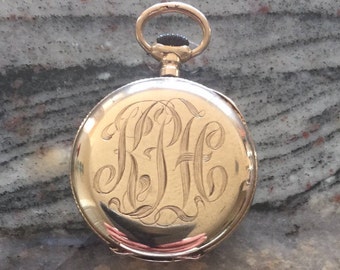 Antique 14KSOLID gold Smith Patterson boston   small pocket watch c1910s running well 18.11 grams