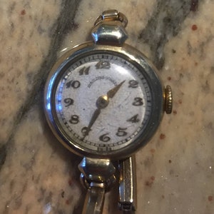 Girard perregaux (swiss) vintage ladies 10k gold filled 17 jewels mid sized 20mm diameter  watch c-1960s runs well