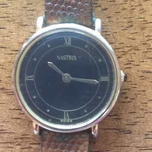 Nastrix (swiss) vintage unisex  mechanical wind  gold plated watch lizard leather strap runs well c/1970s