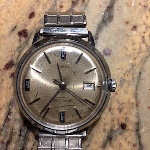 Timex vintage mens automatic  silver dial w black block markers w/ date 35mm stainless steel case 1969 watch runs well