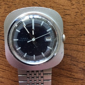 Vintage Timex automatic mens date window blue/silver  dial /stainless steel case runs well 1972