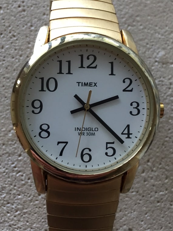 timex indiglo wr 30m change day