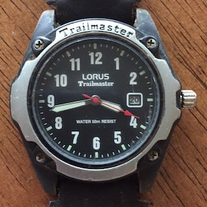 Lorus Trailmaster mens japan quartz  watch w/date w/r 165ft stainless case New battery runs wellFREESHIP