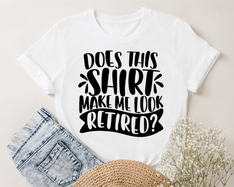 May include: White t-shirt with black text that reads "Does this shirt make me look retired?"