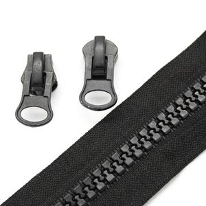 May include: Two black zipper pulls with a metal ring and a black zipper tape.