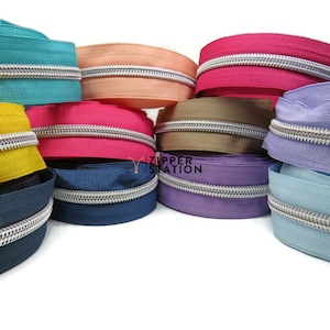 Silver Teeth Continuous #5 Nylon Coil Zip - sold by the meter.  Continuous zipper for upholstery, crafts and repair