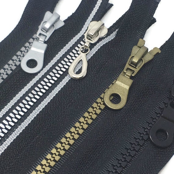 Black 7 inch no3 molded open end zip.Plastic teeth