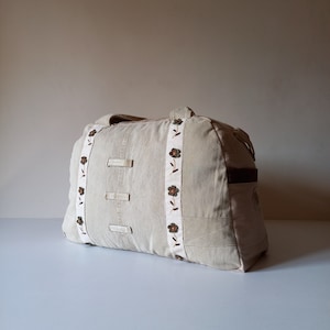 Upcycled Denim Duffle Bag: Floral Accents, Adjustable Strap Weekender