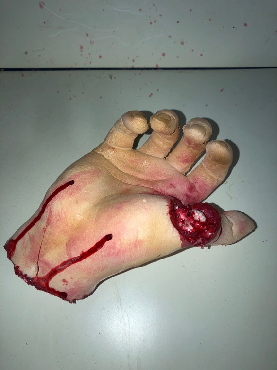 Severed hand dog best sale toy