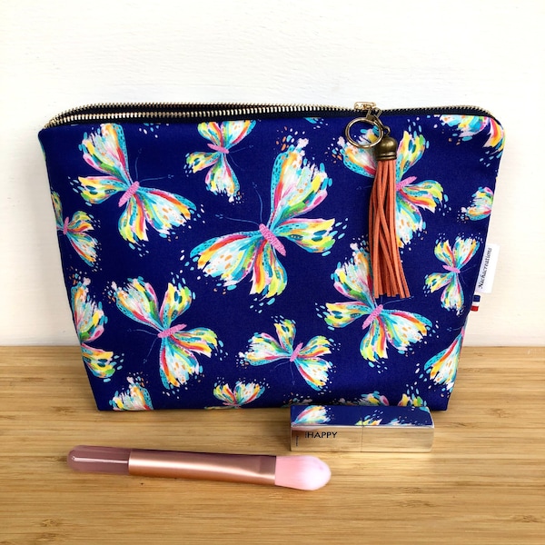 Fleece makeup bag in purple cotton butterfly print. Ettavee fabric .