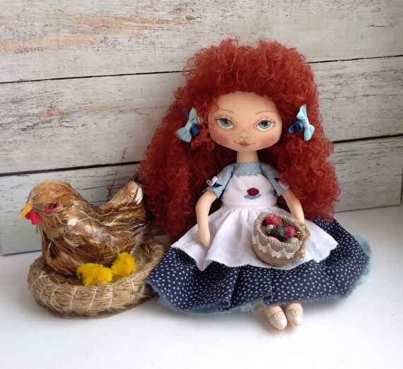 doll with red yarn hair