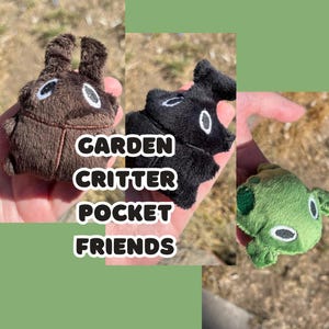 May include: Three small plush garden critter pocket friends in brown, black, and green. The brown critter has two ears and a stitched body. The black critter has a bat-like shape. The green critter is frog-shaped. The text "GARDEN CRITTER POCKET FRIENDS" is in the center.
