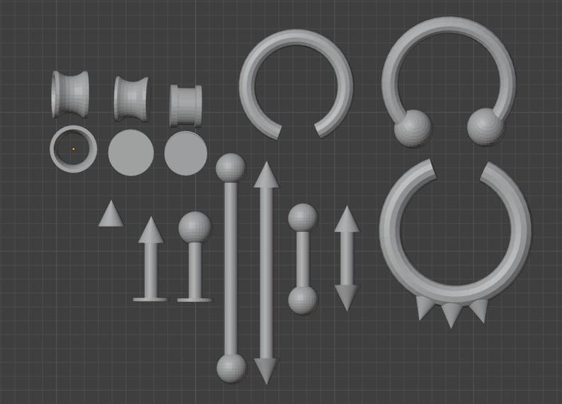 May include: A collection of body jewelry, including ear gauges, circular barbells, and barbell-style piercings. The pieces are in a neutral gray color and arranged on a dark gray grid background. The jewelry includes various shapes and sizes.