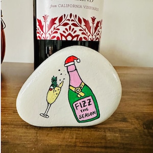 Fizz the Season Painted Rock, Holiday Decor, Christmas Drinks, Painted Stones