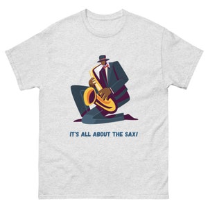 It’s All About the Sax T-Shirt – Funny Saxophone Player Tee – Music Lover’s Graphic Shirt for Men & Women