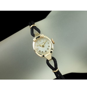 Bulova 14k Yellow Gold Women&#39;s Hand-Winding Watch w/ Cord Bracelet