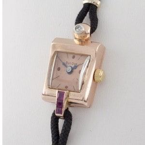 14k Rose Gold Bulova Quartz Watch w/ Diamond/Ruby Accents and Black Cord Band