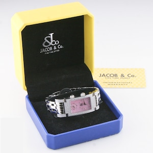 Reloj de cuarzo Jacob & Co. de acero inoxidable con diamantes y ángel, con estuche y documentación, Ref. JCA18L