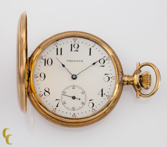 gold hunter watch