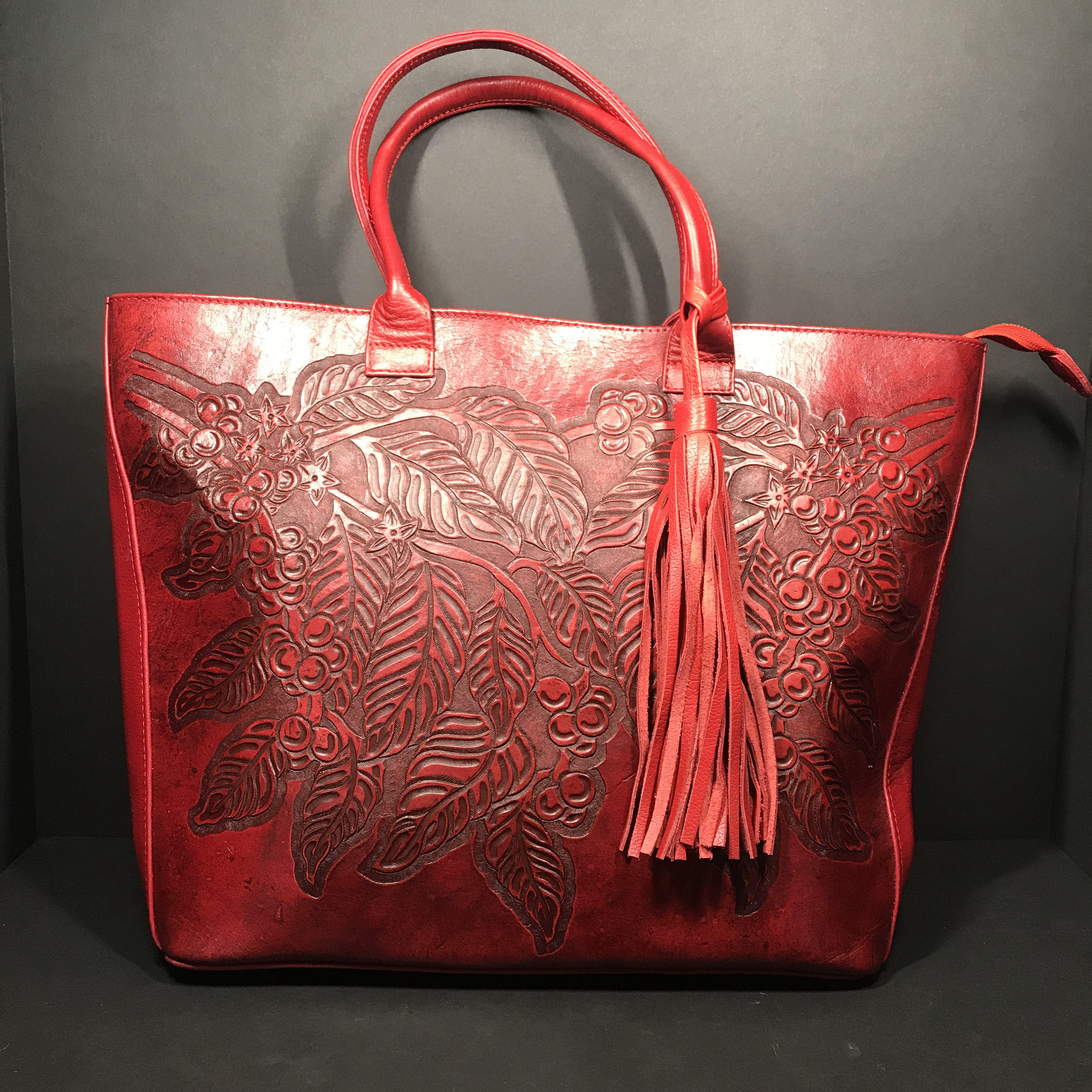 Handmade Tooled Leather Handbags | IUCN Water
