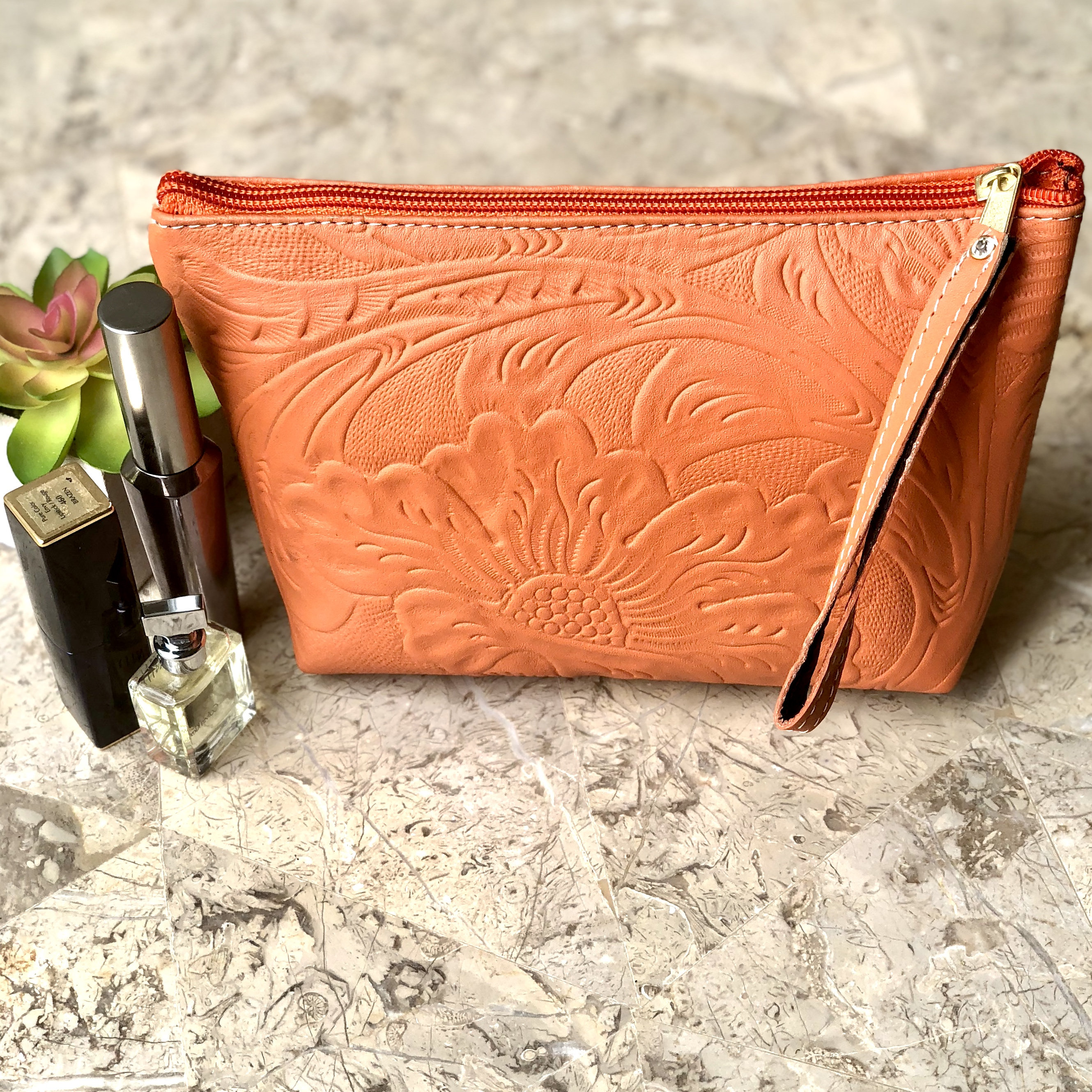 Orange Cosmetic Bag.