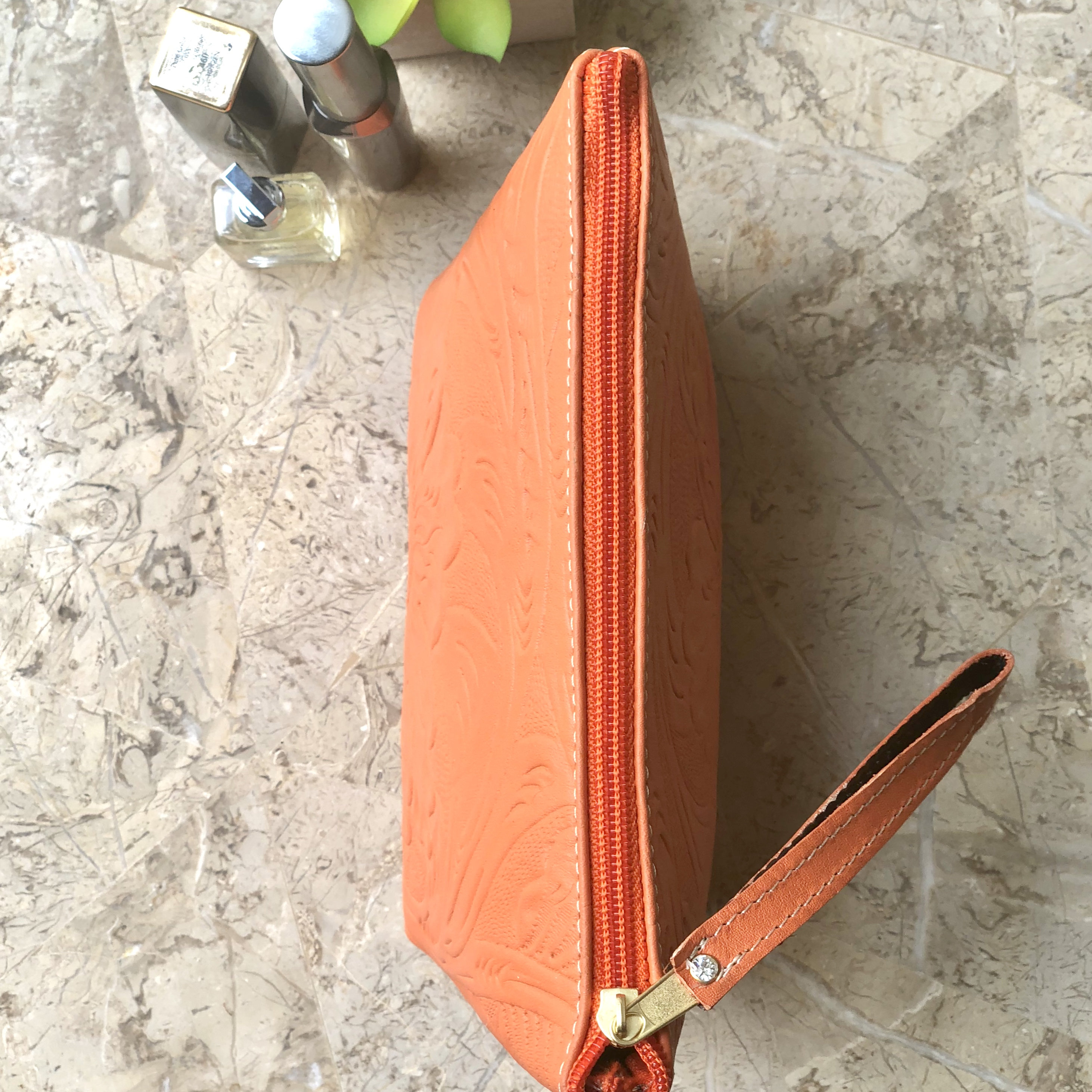Orange Cosmetic Bag.
