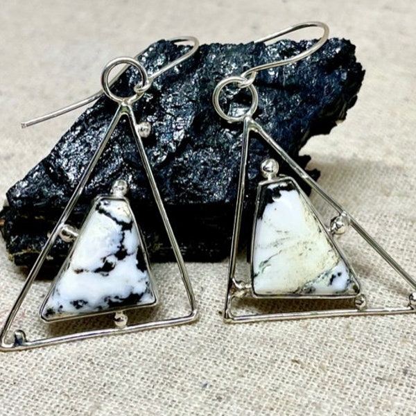 Spectacular and snazzy, these minimalist White Buffalo drops take triangles into new territory