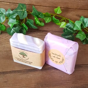 May include: Two bars of lavender and chamomile soap shampoo, one wrapped in purple tissue paper with a "handmade with love" sticker and the other with a brown paper label that reads "The Soap Tree Handmade in Yorkshire Lavender & Chamomile Soap Shampoo Bar"
