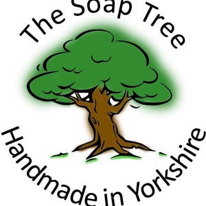 May include: A green tree with a brown trunk and the text "The Soap Tree Handmade in Yorkshire" around it.