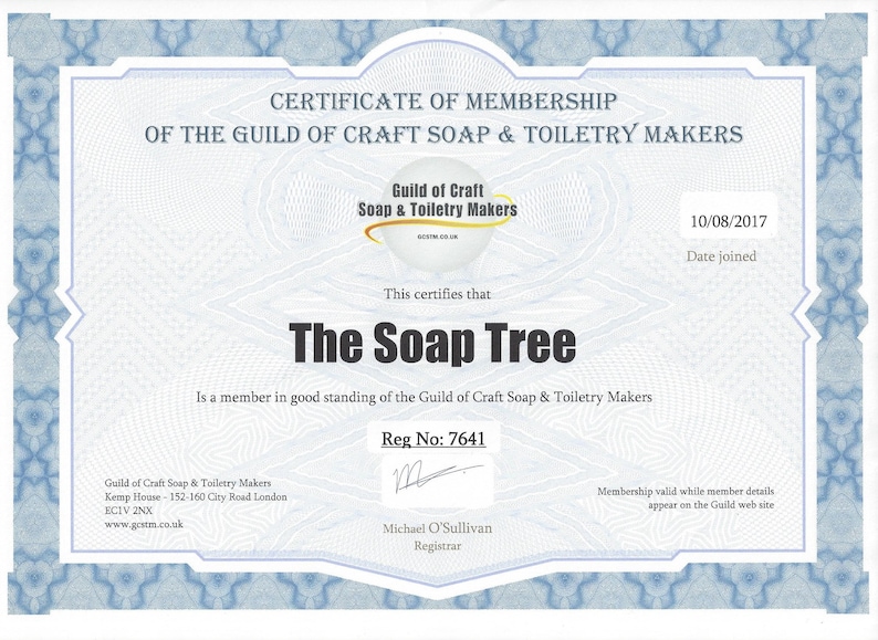 May include: A certificate of membership for The Soap Tree, a member in good standing of the Guild of Craft Soap & Toiletry Makers. The certificate is dated 10/08/2017 and includes the Guild's registration number 7641. The certificate is signed by Michael O'Sullivan, Registrar.
