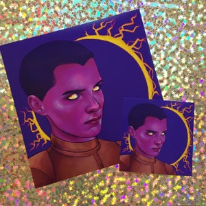 May include: A purple and gold illustration of a person with a halo of lightning. The person has short, dark hair and is wearing a brown shirt.