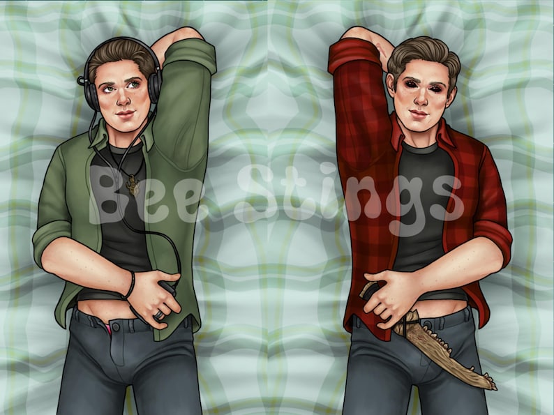 May include: Two men lying on a plaid bedspread. The man on the left is wearing a green shirt, black pants, and headphones. The man on the right is wearing a red plaid shirt, black pants, and a knife.