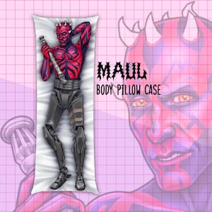 May include: A rectangular body pillow case featuring a full-length illustration of a red and black horned character holding a double-bladed lightsaber. The text MAUL BODY PILLOW CASE is printed in black. The background has a pink grid pattern.