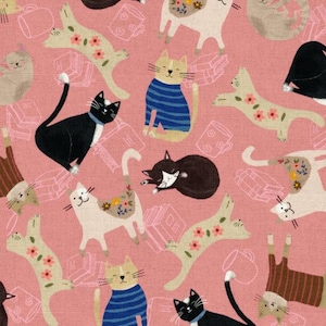 May include: A repeating pattern of whimsical cats in various poses on a pink background. Some cats wear blue striped sweaters or floral decorations. Other elements include books and mugs, creating a playful, illustrated design.