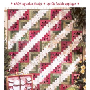 May include: Watermelon Picnic quilt pattern featuring a log cabin block design with watermelon slices. The quilt is 53 inches by 60 inches. The pattern is by Black Mountain Needleworks.