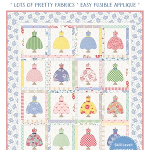 May include: A patchwork quilt pattern with a design of dresses in different colours and patterns. The words "Pretty Dresses" are in pink script. The text "Lots of pretty fabrics * easy fusible applique" is also visible.