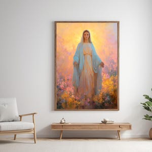 May include: A framed artwork depicts a serene figure in flowing robes, standing amidst a vibrant field of flowers. The figure is draped in light blue and cream-colored garments, with a soft, golden light emanating from behind. The artwork is displayed in a room with a wooden table and chair.
