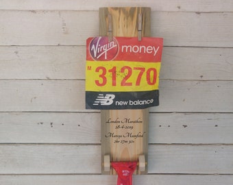 Marathon Bib Number Display with Medal Hanger. Personalise with your name and time. Made from reclaimed materials. Customise for any race.
