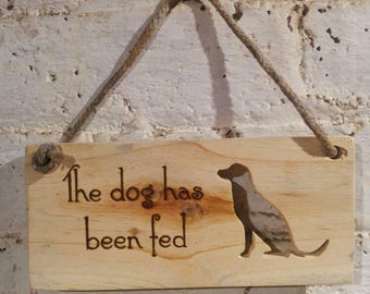 Reclaimed Wood Dog Feeding Sign: Personalized Pyrography Pet Decor. Dog Has Been Fed.