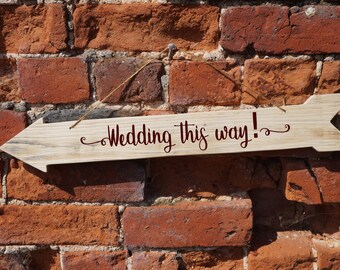 Wooden arrow sign for weddings, parties and special occasions. Rustic. Customised. Made from reclaimed wood.