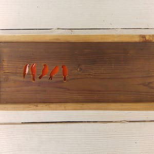Wooden wall art of birds on a wire hand made from reclaimed wood