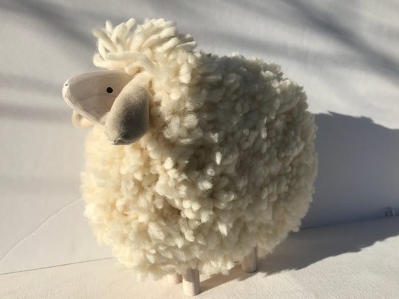 wooden sheep with wool