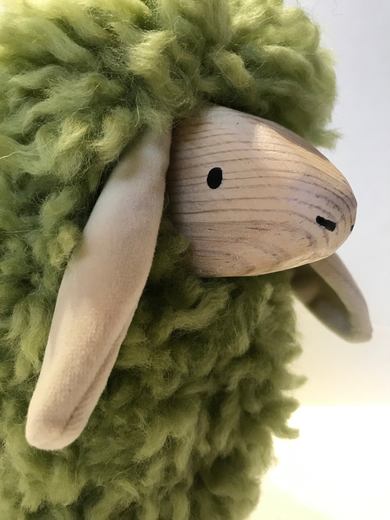 wooden sheep with wool