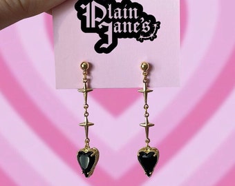 Black heart gold cross earrings