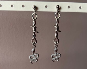 Silver barbed wire snake earrings