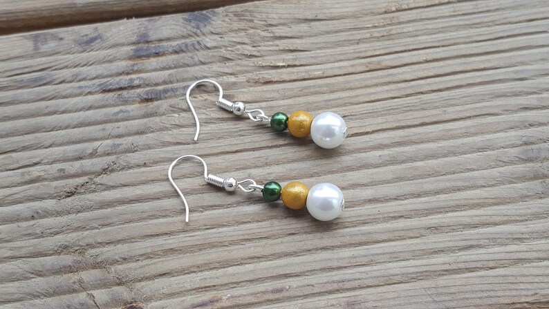 wedding adornment tahitia tiare flowers of the frangipani Islands white yellow rustic adjustable handmade earrings offered